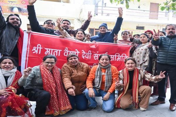 Shri Mata Vaishno Devi Sangharsh Samiti members celebrate the NMC's decision in Jammu.